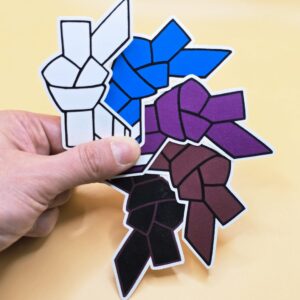 Ranked Jiu-Jitsu stickers fanned in order from top to bottom in white, blue, purple, brown, and black