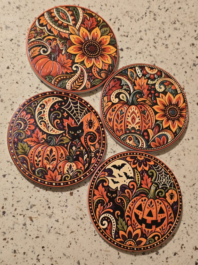 A set of four UV‑printed porcelain coasters featuring unique autumn and Halloween motifs — pumpkins, sunflowers, leaves, and black cats. Each piece combines vibrant color, fine detail, and durable craftsmanship for stylish seasonal use.
